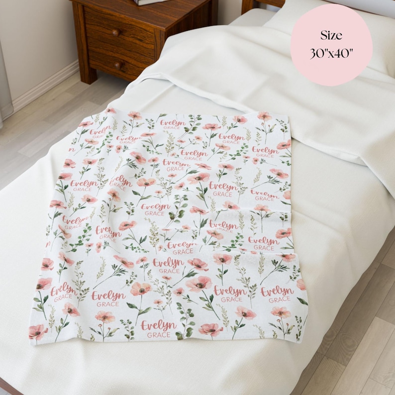 Wildflower blanket for baby’s first going home outfit, personalized with her name and wrapped in soft florals for that precious ride home from the hospital.