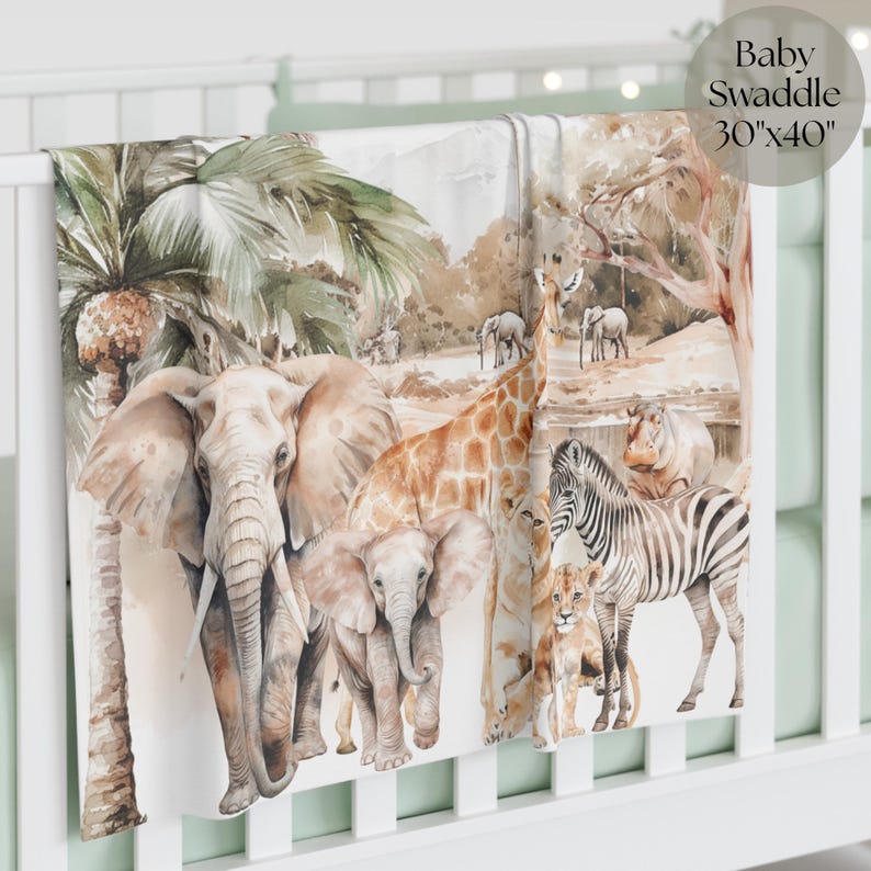 May include: A baby swaddle blanket, 30"x40", features a watercolor illustration of African animals. The design includes elephants, giraffes, zebras, and lions in a naturalistic setting with palm trees and a watering hole.