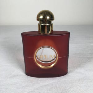 Flacone vuoto vintage YSL Opium da donna, interamente in vetro, per Eau de Toilette, 47 ml.