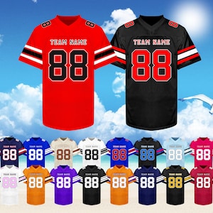 May include: A selection of American football jerseys in diverse colours, such as red, black, blue, and white. Each jersey displays the number "88" in a prominent font and the text "TEAM NAME". The jerseys have contrasting stripes on the sleeves.
