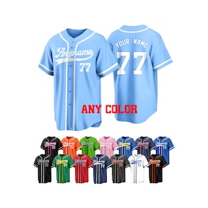 May include: Light blue baseball jersey with white accents, featuring the text "Anyname" and the number "77". The back of the jersey displays "Your Name" and the number "77". A variety of color options are shown below.