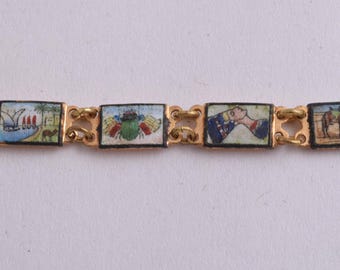 Vintage Egyptian Revival Enamel Brass Cuff: Ornate Cleopatra-Inspired Wrist Adornment