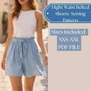 May include: Pale blue high-waisted belted shorts with a matching tie, worn with a white vest top. The image includes text: "Hight Waist Belted Shorts Sewing Pattern" and "Sizes included: XXS-XXL PDF FILE."