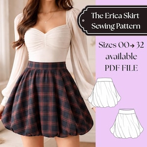 May include: A woman wearing a white top with long, sheer sleeves and a plaid skirt. The skirt is a dark color with red and black plaid. The text on the image says "The Erica Skirt Sewing Pattern" and "Sizes 00-32 available PDF FILE."
