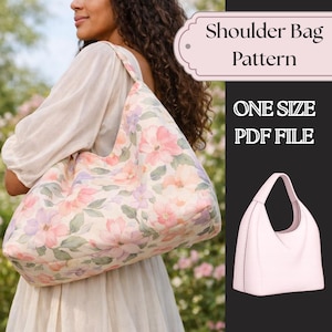 May include: A floral shoulder bag pattern with a pink, purple, and green flower design. The bag is being worn over the shoulder. The image also includes a solid pink shoulder bag and text that reads "Shoulder Bag Pattern", "ONE SIZE", and "PDF FILE".