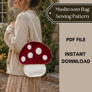 May include: A mushroom-shaped bag sewing pattern in a PDF file format for instant download. The bag features a deep red cap with white circular spots and a white stem base, suspended by a thin white strap. Text reads Mushroom Bag Sewing Pattern.