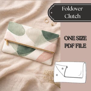 Könnte beinhalten: Falt-Clutch mit einem Aquarelldesign in Grün-, Rosa- und Beigetönen. Die Clutch hat einen goldenen Reißverschluss und den Text "Foldover Clutch" und "ONE SIZE PDF FILE".