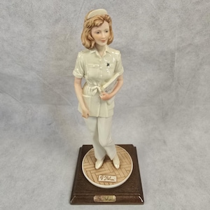 A Belcari Figurine - Etsy