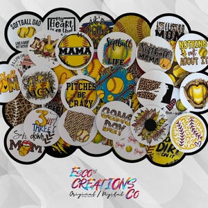 May include: A collection of round softball-themed designs with various graphics and text. Designs include baseballs, leopard print, and phrases like "Softball Mom," "Pitches Be Crazy," and "Game Day." The designs are in yellow, white, and black.