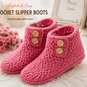 May include: A pair of bright pink crochet slipper boots featuring two light brown wooden buttons on the side of each ankle. The text "Stylish & Cozy CROCHET SLIPPER BOOTS Handmade with love" is printed in the upper left corner of the image.