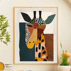 May include: A framed wall art print featuring a stylized giraffe head composed of geometric shapes and patterns in shades of mustard yellow, deep blue, terracotta, and black, set against a light cream background with a thin wooden frame.