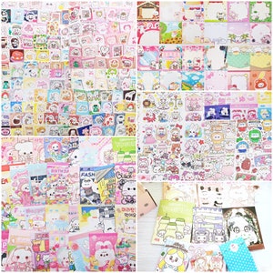 May include: A collection of colorful stickers featuring cute cartoon characters, including bunnies, bears, and other animals. The stickers are arranged in rows and columns on a white background. Some of the stickers have text on them, such as "Yogurt" and "Birthday".