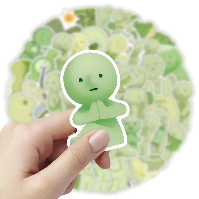 Peut inclure: Une feuille d'autocollants verts et blancs repr&eacute;sentant une vari&eacute;t&eacute; de personnages de dessins anim&eacute;s mignons. Les personnages sont tous dans des poses et des expressions diff&eacute;rentes, et certains tiennent des objets comme des fleurs ou des c&oelig;urs. Les autocollants sont parfaits pour ajouter une touche de fantaisie &agrave; votre agenda, votre ordinateur portable ou votre bouteille d'eau.