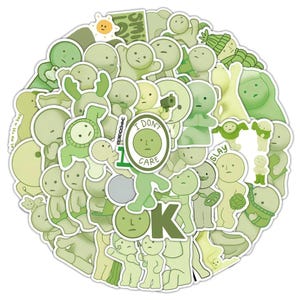 Peut inclure: Un ensemble d'autocollants verts et blancs repr&eacute;sentant divers personnages de dessins anim&eacute;s avec diff&eacute;rentes expressions et phrases. Les autocollants comprennent des phrases comme "Je m'en fiche", "Slay" et "Ok".
