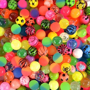 May include: A large collection of colorful bouncy balls in various designs, including stars, stripes, and smiley faces. The balls are made of rubber and are perfect for playing games or just having fun.