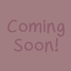 May include: A mauve background with the words "Coming Soon!" in a darker mauve, handwritten-style font. The text is centered and takes up most of the image space, creating a simple, yet eye-catching announcement.