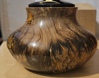 2425 Small Scub oak keep sake box or small urn. Gold leaf and black burmese lid