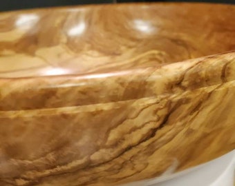 Arizona olive wood bowl with green blue and red resin. 10.75x 3.25  Rh2407