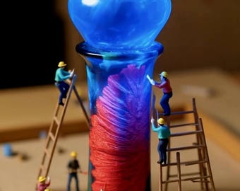 20251  9&quot; Handmade maple burl pepper or salt grinder. Red infused heat cured with green and blue colors of resin.