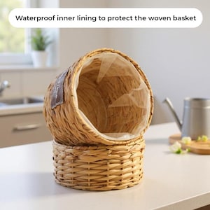 May include: Woven basket with a waterproof inner lining. The basket is made of natural-colored woven material and has a round base. The top section is oval-shaped. The text "Waterproof inner lining to protect the woven basket" is visible.