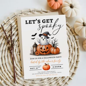 May include: A Halloween party invitation with the text "LET'S GET spooky". The invitation features a ghost wearing a witch hat, sitting on a carved pumpkin, with bats and a tree. The invitation also includes the date, time, and address.