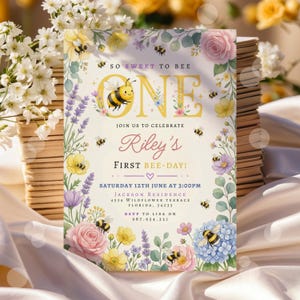 May include: A floral-themed invitation with the text "So Sweet to Bee One" and "Riley's First Bee-Day!" features a cartoon bee, flowers, and the event details. The design includes pink, yellow, purple, and blue flowers, with a light cream background.