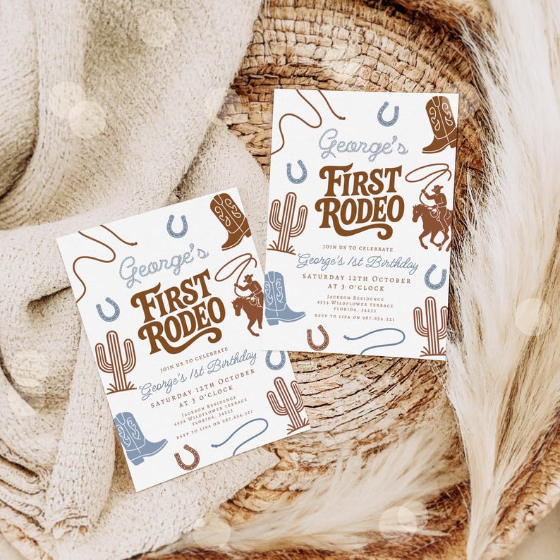 May include: Two invitation cards with a western theme. The cards feature the text "George's First Rodeo" in brown and blue, along with illustrations of cowboy boots, cacti, horseshoes, and a cowboy. The cards are on a textured surface.
