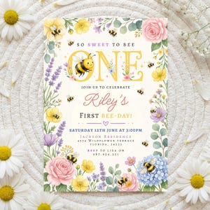 May include: A floral invitation with the text "So Sweet to Bee One" and "Riley's First Bee-Day!" features a bumblebee and floral border with pink, yellow, and purple flowers. The invitation includes event details.