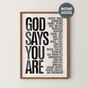 May include: A wooden framed print featuring the text "GOD SAYS YOU ARE" in bold black letters. The right side lists positive qualities such as "FAITHFUL, HONEST, COURAGEOUS." A circular sticker reads "INSTANT ACCESS".