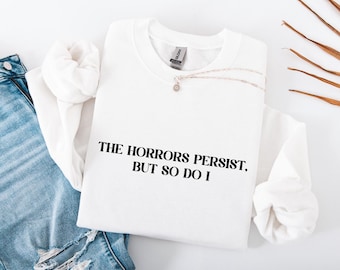 Sudadera con el lema "Los horrores persisten, pero yo también", sudadera con cuello redondo y diseño de meme a la moda.