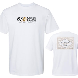 May include: White t-shirt with the Devlin Macgregor Pharmaceuticals logo on the front. The logo features black and gold elements. The back of the shirt has a rectangular design with text and a diamond pattern.