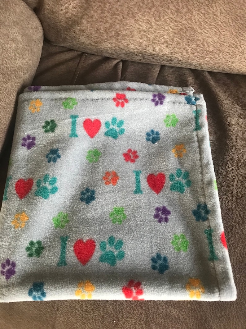 27x28 smal and purple,yellow,orange,red and tea paws, l with a grey background plush fleece cat or dog blanket, Fleece blanket
