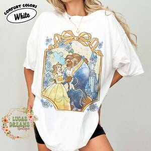 Camiseta vintage de princesas Disney con lazo coqueto, Bella, Ariel, Elsa y Cenicienta, camiseta del Castillo Mágico del Reino Mágico, regalo de viaje para niñas de Walt Disney Blanco