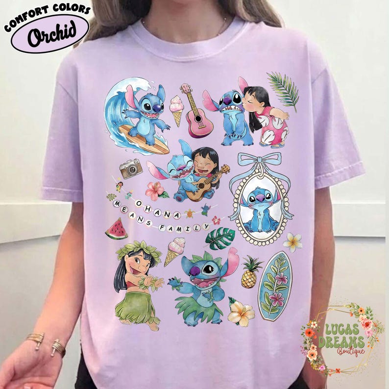 May include: Orchid Comfort Colors t-shirt featuring a colorful graphic of Stitch from Lilo & Stitch. The design includes Stitch surfing, playing guitar, and with Lilo. The phrase "OHANA MEANS FAMILY" is also displayed.