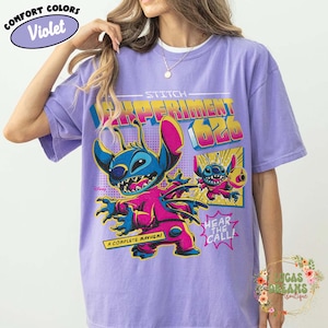 May include: Violet Comfort Colors t-shirt featuring Stitch from Lilo & Stitch. The graphic includes Stitch in a pink and blue outfit with the text "Experiment 626" and "A Complete Mayhem!"