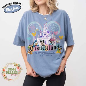 Koszulka Vintage Disneyland Est 1955, Koszulka Disneyland FamilyTrip, Koszulka Mickey and Friends 2026, Koszulka Disneyland Vacation, Koszulka Magic Kingdom Blue Jean/Light Blue