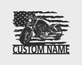 May include: Black motorcycle silhouette with the American flag in the background. The design includes the text "CUSTOM NAME" at the bottom, perfect for personalization. A patriotic and stylish piece.
