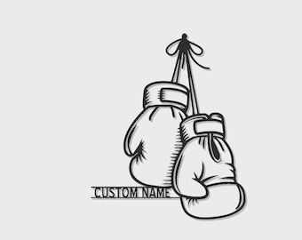 May include: A black and white line art illustration of a pair of boxing gloves hanging by their laces. The gloves are depicted in a sketch style with bold outlines. A horizontal bar is positioned below the gloves with the text CUSTOM NAME.