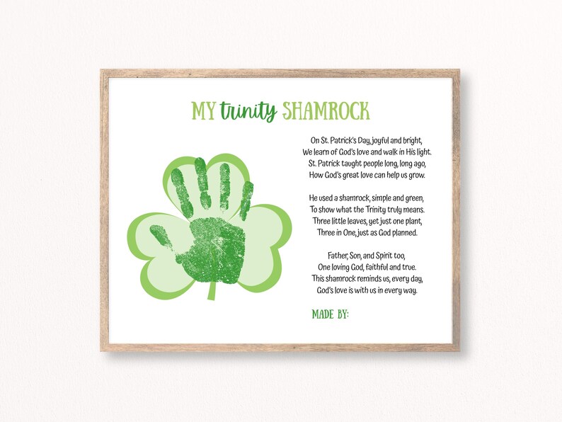 May include: A framed print featuring a green handprint within a shamrock design, with the text "MY trinity SHAMROCK" at the top. The print includes a poem about St. Patrick's Day and the Trinity. The words "MADE BY:" are at the bottom.