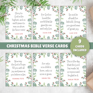 May include: A set of Christmas Bible verse cards featuring six rectangular cards with green foliage and red berry borders. Each card displays a unique scripture passage and citation in black text. A green banner states Christmas Bible Verse Cards.