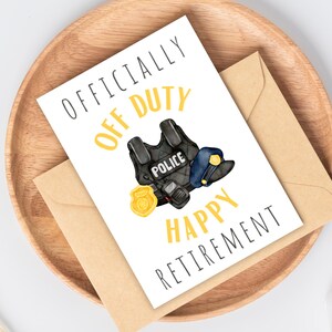 May include: A white card with the text "OFFICIALLY OFF DUTY HAPPY RETIREMENT" in black and yellow lettering. A black police vest with a yellow "POLICE" patch and a blue police hat are illustrated on the card.