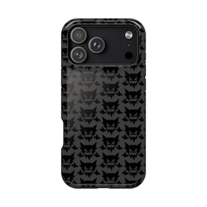 May include: Black phone case with a repeating pattern of a cartoon ghost face. The case has a glossy finish and a cutout for the phone's camera lenses.