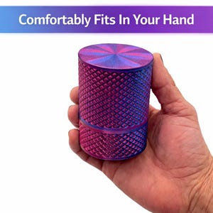 Hand holding compact injection cartridge storage case showing pocket size portability, textured grip container designed for discreet and organized cartridge storage