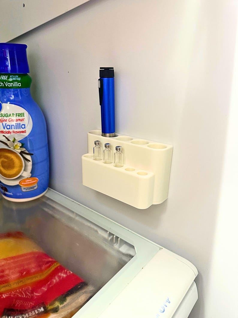 Fridge mounted GLP-1 organizer holding injection pen and small glass vials, compact peptide and insulin pen holder, space saving refrigerator storage solution for keeping medication pens upright and organized