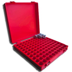 May include: A bright red storage case, open to reveal a grid of circular compartments. A small group of vials with silver caps rests in the upper right corner. The case is designed for organized storage and transport.