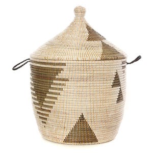 May include: A woven basket with a lid, featuring a geometric pattern in shades of brown and beige. The basket has a rounded body and a conical lid with a small knob on top. It has two small black handles on the sides.