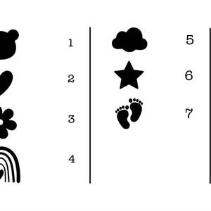 K&ouml;nnte beinhalten: Schwarz-Wei&szlig;-Illustrationen verschiedener Formen, darunter ein B&auml;renkopf, ein Herz, eine Blume, ein Regenbogen, eine Wolke, ein Stern und Babyf&uuml;&szlig;e. Die Formen sind in zwei Spalten angeordnet.