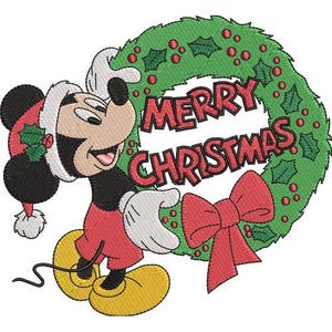 May include: A cartoon image of Mickey Mouse wearing a Santa hat and red pants, holding a green wreath with red berries and the words "MERRY CHRISTMAS" in red. A red bow is at the bottom of the wreath. The background is white.