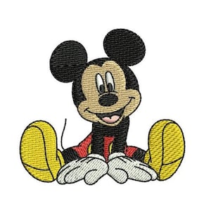 May include: Embroidered image of Mickey Mouse, a cartoon character, sitting with his legs spread. Mickey is wearing black shorts and a red shirt. His large yellow shoes are visible. His black ears and smiling face are prominent.