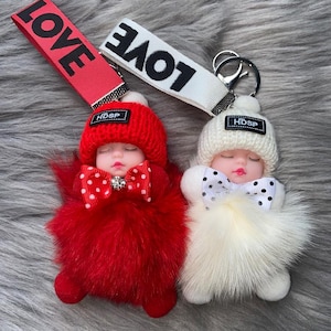 Buy 1 Get 1 Random Free - Sleeping Baby Doll Keychain–Cartoon doll schoolbag creative small gifts|Cute Accessory for Bags, Cars & Gift Ideas